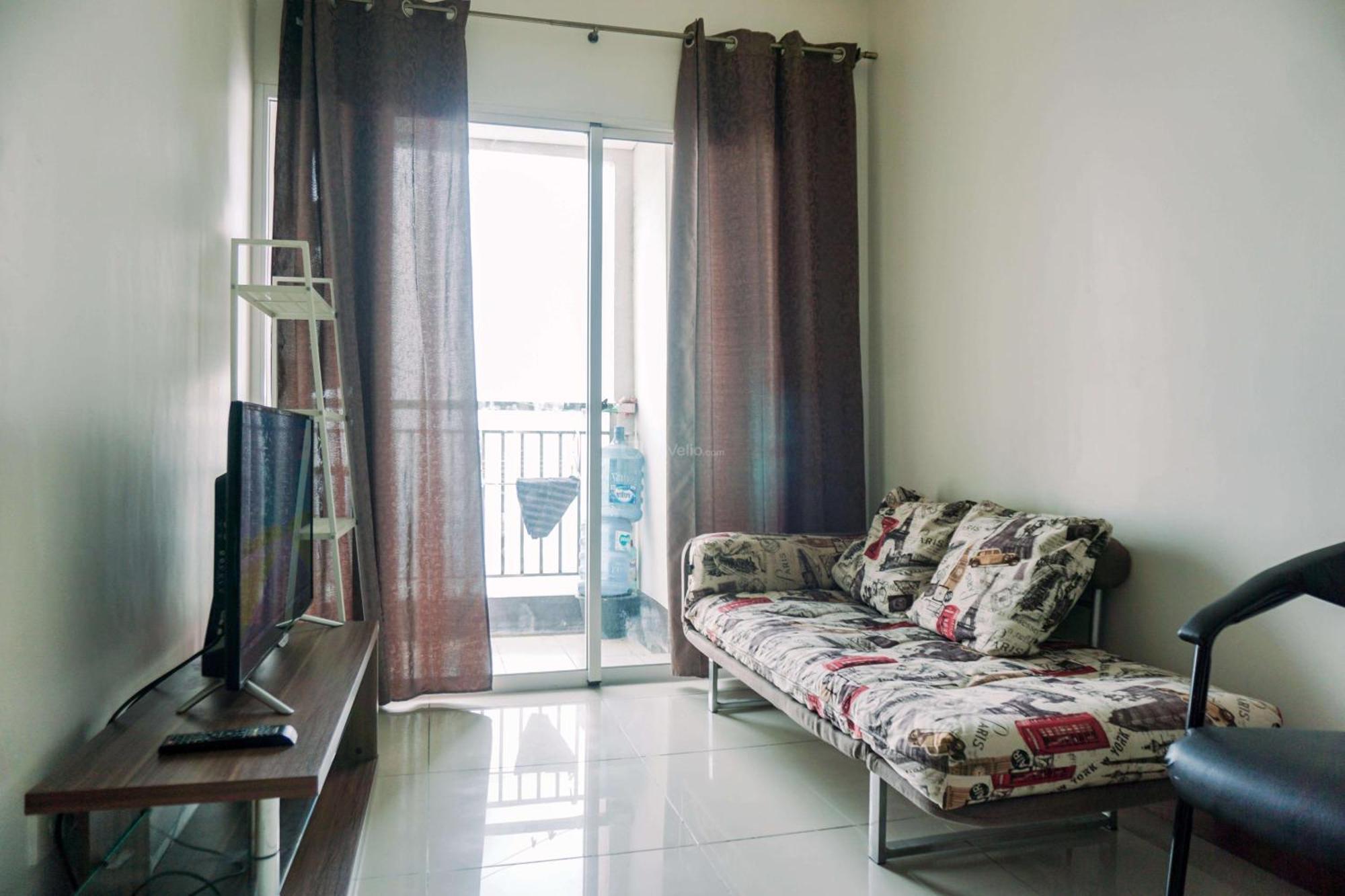 Modern Look 1br Bay By Travelio Apartemen *